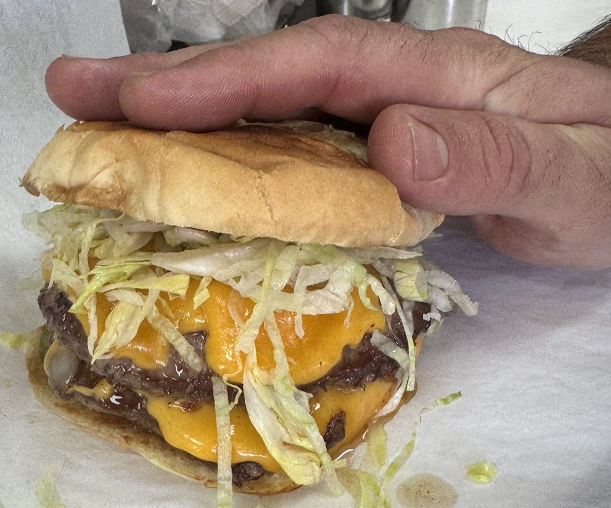 Double cheeseburger with shredded lettuce